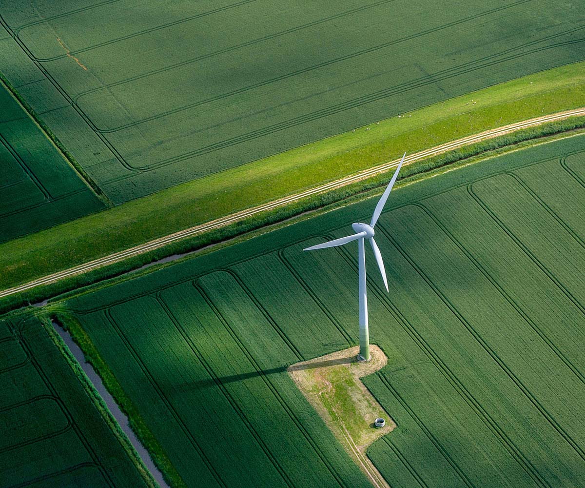 Wind turbine in green field